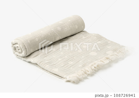 Gray muslin blanket for kids on white background Gray muslin blanket for kids on white background 108726941