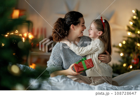 family celebrating Christmas 108728647