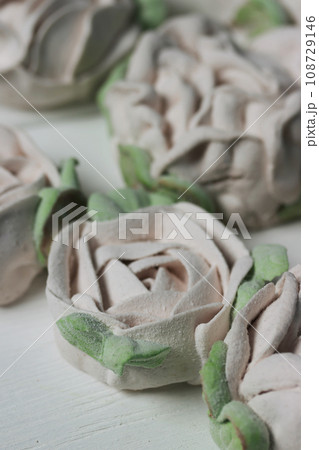 Flowers from marshmallows. Homemade marshmallows. Photographed from above. Close-up. 108729146