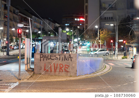 A Sign on street of Lisbon: Palestina livre - freedom of Palestine - night view A Sign on street of Lisbon: Palestina livre - freedom of Palestine - night view 108730060