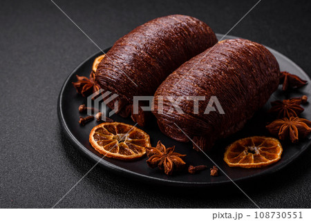 Delicious sweet crispy puff pastry with chocolate filling Delicious sweet crispy puff pastry with chocolate filling 108730551