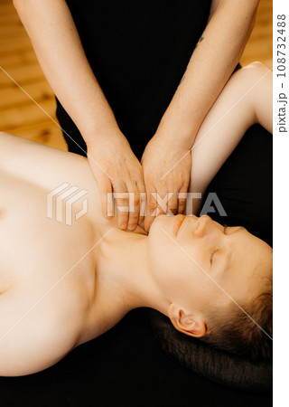 Close-up of man getting massage 108732488