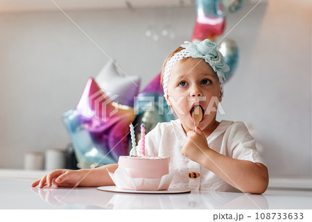 Child celebrating her three years anniversary 108733633