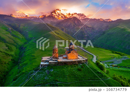 Aerial view of Gergeti trinity church at sunrise in Georgia. 108734779