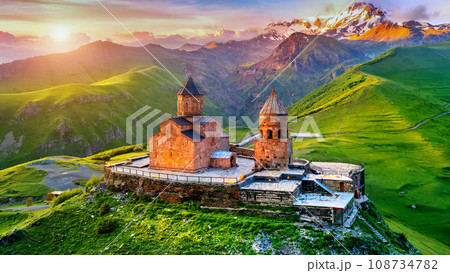 Aerial view of Gergeti trinity church at sunrise in Georgia. 108734782