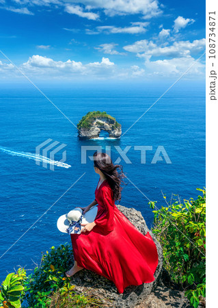 Tourist enjoying Banah cliff at nusa penida island, bali, Indonesia. Tourist enjoying Banah cliff at nusa penida island, bali, Indonesia. 108734871