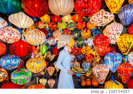 Asian woman wearing vietnam culture traditional and hoi an lanterns at Hoi An ancient town, Vietnam. 108734887