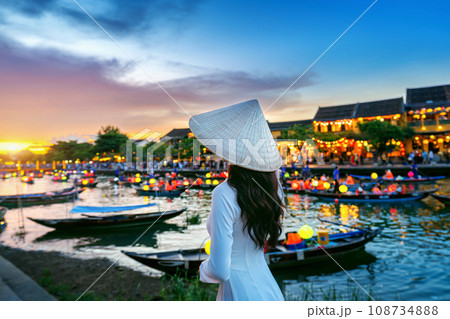 Asian woman wearing vietnam culture traditional at Hoi An ancient town,Hoi an city in Vietnam. Asian woman wearing vietnam culture traditional at Hoi An ancient town,Hoi an city in Vietnam. 108734888