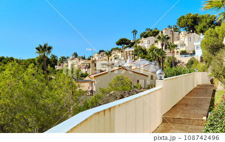 Pretty Spanish white residential houses Pretty Spanish white residential houses 108742496