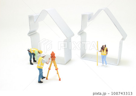 a Land surveyor on construction site with figure 108743313