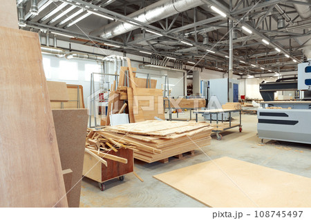 Interior of large workshop of contemporary furniture factory Interior of large workshop of contemporary furniture factory 108745497