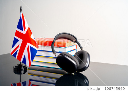 English language learning concept with books and flag of Great Britain English language learning concept with books and flag of Great Britain 108745940