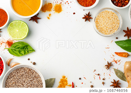 Beautiful composition with various spices on white background Beautiful composition with various spices on white background 108746056