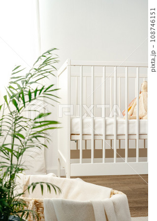 Interior of nursery room with baby crib and cradle Interior of nursery room with baby crib and cradle 108746151