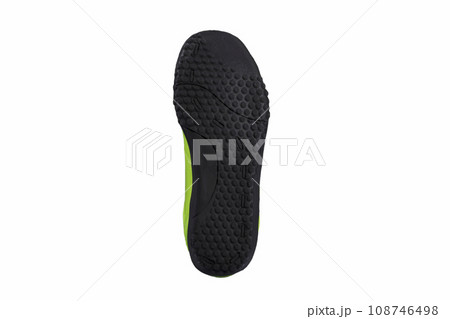 Black sole green glossy sneaker on a white background. Sport shoes. 108746498