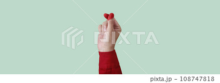 finger heart gesture, web banner format finger heart gesture, web banner format 108747818