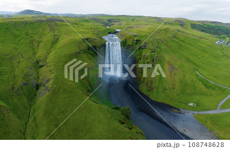 Aerial view on the Skogafoss waterfall, Iceland. Famous place. Aerial view on the Skogafoss waterfall, Iceland. Famous place. 108748628