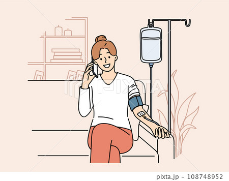 Happy woman receiving dropper with vitamins sitting on couch at home and talking to doctor on phone Happy woman receiving dropper with vitamins sitting on couch at home and talking to doctor on phone 108748952