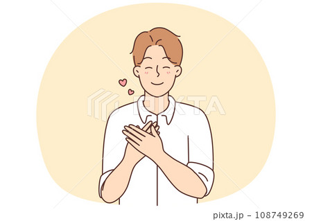 Happy man with hold at chest feel grateful 108749269
