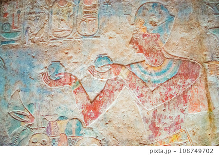Colorful Egyptian hieroglyphs as an ancient background. Colorful Egyptian hieroglyphs as an ancient background. 108749702