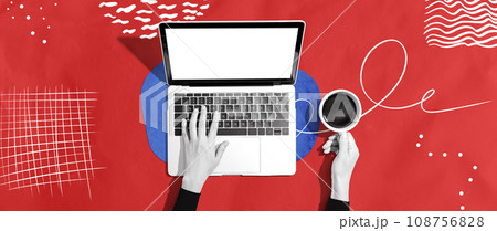 Person using a laptop computer 108756828