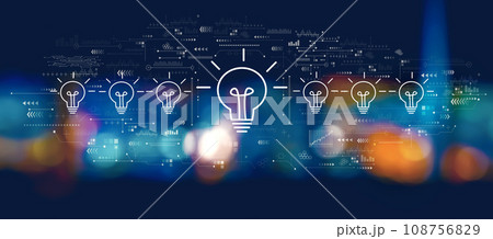 Idea light bulb theme with blurred city at night Idea light bulb theme with blurred city at night 108756829