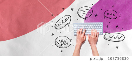 Speech bubbles and a computer keyboard Speech bubbles and a computer keyboard 108756830