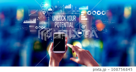 Unlock your potential theme with person using a smartphone at night 108756845