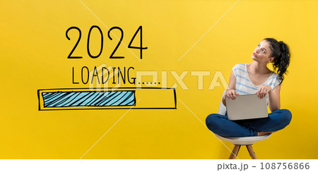 Loading new year 2024 with woman using a laptop Loading new year 2024 with woman using a laptop 108756866
