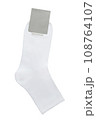 White sock with blank promotional tag and space for text and logo. Isolated on a white background. Copy space. Mockup. 108764107