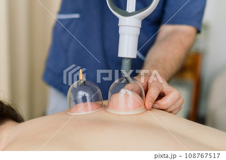 Anti-cellulite foot massage for a fat woman. Concept of personal care, weight loss, diet. Close-up. 108767517