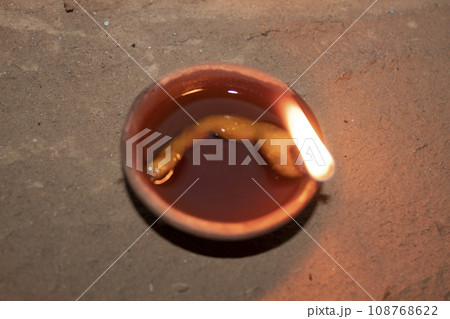 Burning Diwali Diya lamp 108768622
