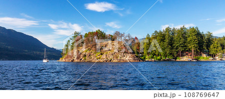 Rocky Shore and Mountain Landscape in Indian Arm, Vancouver, BC, Canada. Rocky Shore and Mountain Landscape in Indian Arm, Vancouver, BC, Canada. 108769647