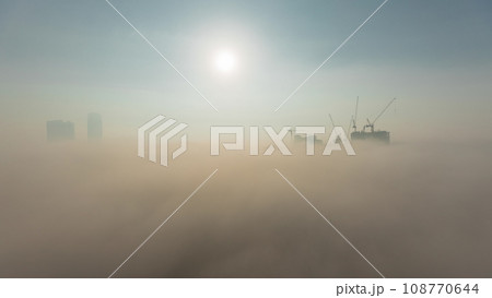 Modern city architecture in Business bay district before sunrise. Panoramic view of Dubai's skyscrapers all night timelapse 108770644