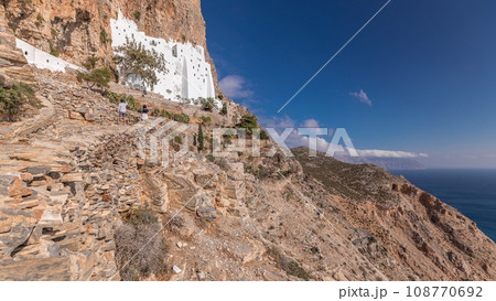 The Hozoviotissa Monastery standing on a rock over the Aegean sea in Amorgos island timelapse hyperlapse, Greece. 108770692