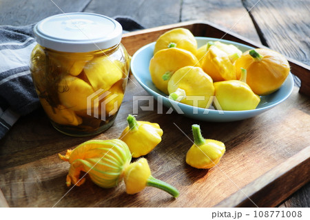 Marinated pattyson. Jar with vegetable preserves Marinated pattyson. Jar with vegetable preserves 108771008