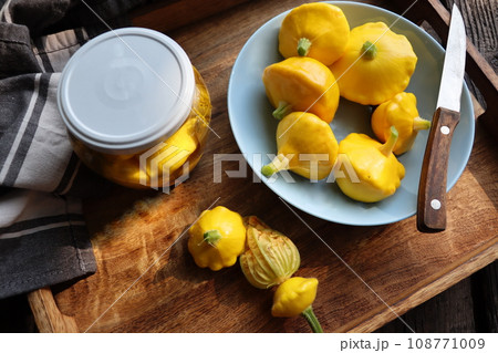 Marinated pattyson. Jar with vegetable preserves Marinated pattyson. Jar with vegetable preserves 108771009
