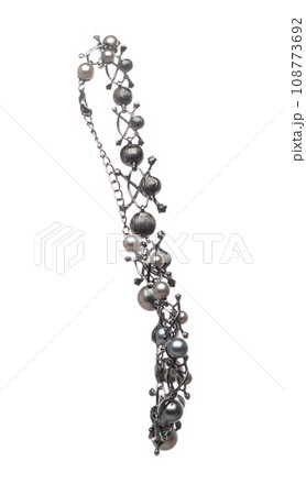 Pearl bead style necklet fly in air. Deep sea pearl bead necklace as gemstone for fashion ornament decorative items. Fashion ornament necklace to add more style. White background isolated Pearl bead style necklet fly in air. Deep sea pearl bead necklace as gemstone for fashion ornament decorative items. Fashion ornament necklace to add more style. White background isolated 108773692