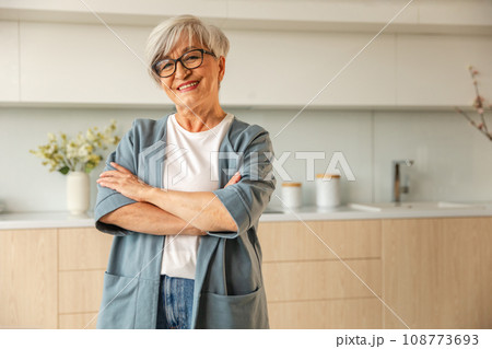 Portrait of confident stylish european middle aged senior woman. Older mature 60s lady smiling at home. Happy attractive senior female looking camera close up face headshot portrait. Happy people 108773693