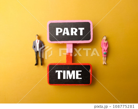 Wooden board and miniature people with text PART TIME on a yellow background. 108775281