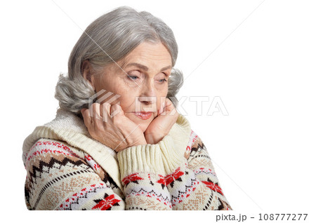 thoughtful senior woman isolated on white background 108777277