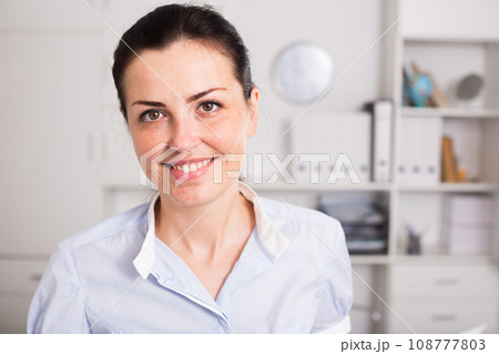 positive employee female working in the office 108777803