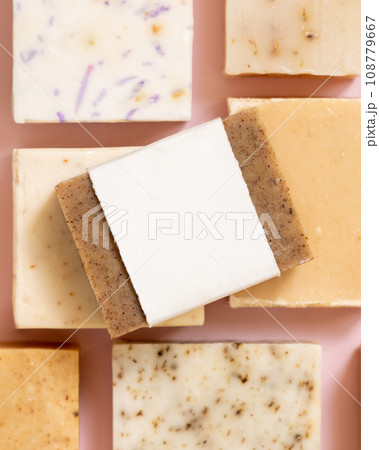 Beige and brown handmade soap bars on light pink top view, soap packaging mockup Beige and brown handmade soap bars on light pink top view, soap packaging mockup 108779667
