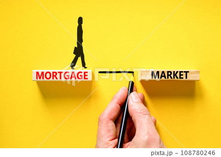 Mortgage market symbol. Concept words Mortgage market on beautiful wooden blocks. Businesswoman icon. Beautiful yellow table yellow background. Business mortgage market concept. Copy space. Mortgage market symbol. Concept words Mortgage market on beautiful wooden blocks. Businesswoman icon. Beautiful yellow table yellow background. Business mortgage market concept. Copy space. 108780246