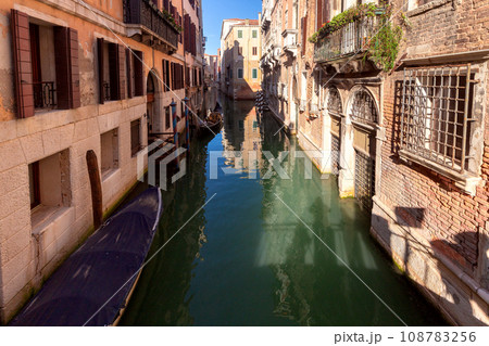Venice. Old stone traditional houses over the canal. Venice. Old stone traditional houses over the canal. 108783256