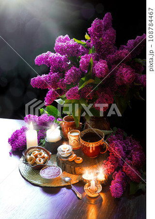Still life from food and lush lilac boquet Still life from food and lush lilac boquet 108784467