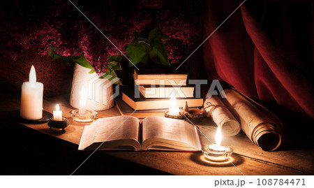 Still life from ancient book and lush boquet 108784471