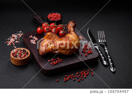 Delicious grilled chicken leg or quarter with salt and spices 108784497