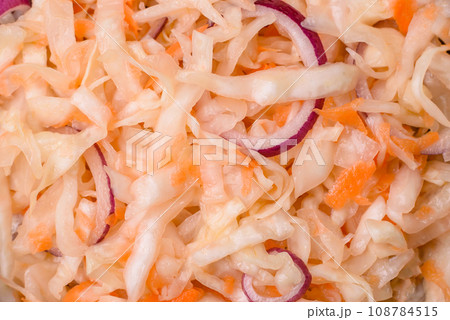 Delicious pickled salted cabbage with carrots, salt and spices Delicious pickled salted cabbage with carrots, salt and spices 108784515