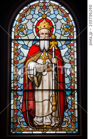 Stained Glass Windows with Saint Nicholas: Stained glass or window decorations featuring Saint Nicholas, creating a festive mood 108786260
